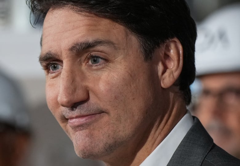 Prime Minister Justin Trudeau pauses while speaking during a housing announcement at a social housing high-rise tower under construction, in Vancouver, on Friday, November 8, 2024.