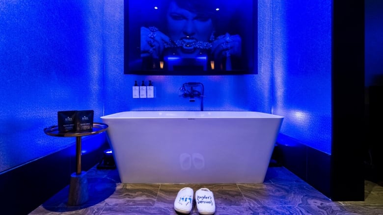 A blue Taylor Swift hotel bathroom.