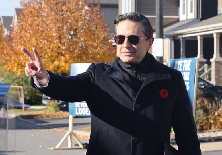 Conservative Leader Pierre Poilievre leaves a press conference in Ottawa on Monday, Oct. 28, 2024.