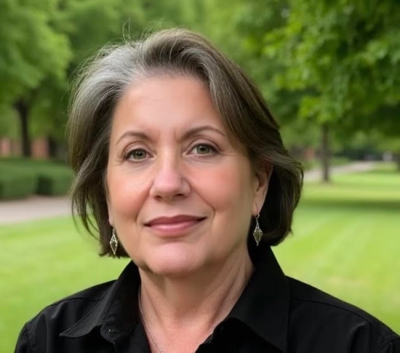 A headshot of a woman