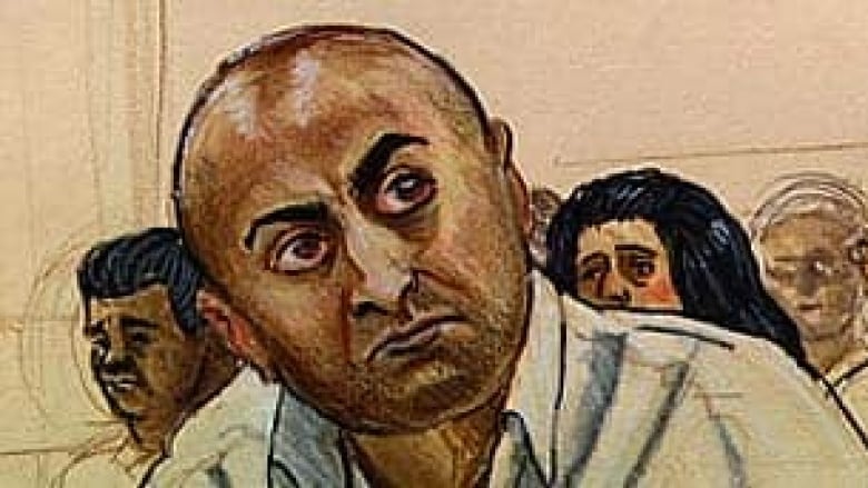 A court sketch of a bald brown man in court.